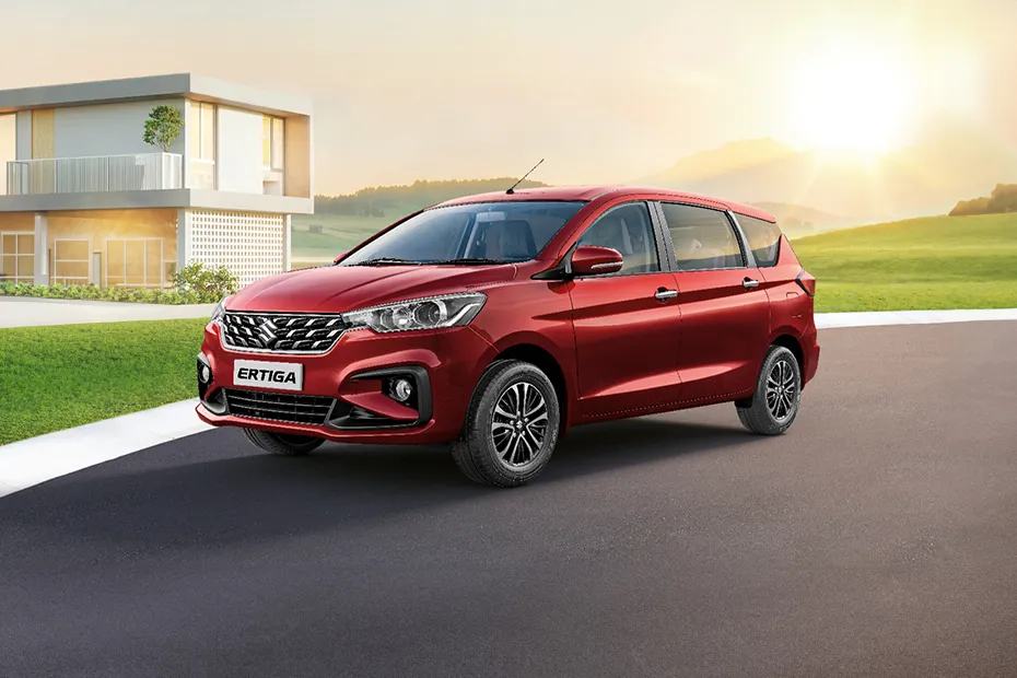 Red Maruti Suzuki Ertiga for luxury car rental Jaipur